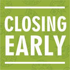 Green and white sign saying closing early