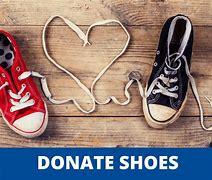 donate shoes with 2 pairs of shoes connected by heart shoe lace
