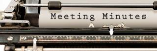 Meeting Minutes typed on a typewriter