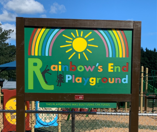 rainbows end playground sign
