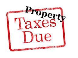 property taxes dues written in black and red