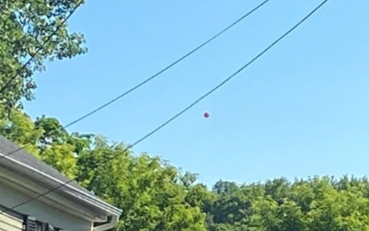 red balloon in the air
