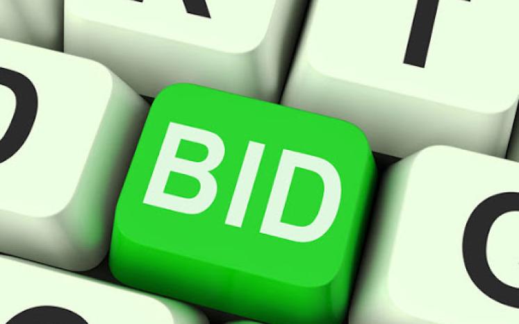 keyboard with the word bid as a key