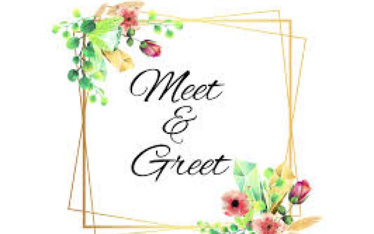 Meet and Greet sign with flowers