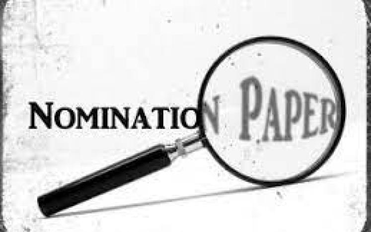 Nomination papers with magnifying glass