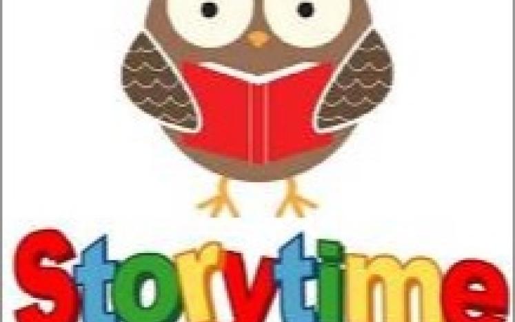 cartoon owl with story time written in red, blue, green and yellow